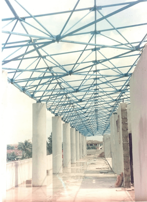 B. View from under of this large span Roof Structure showing the support details at the cylindrical Concrete Stanchions.